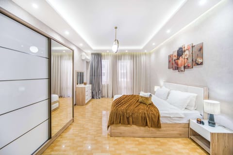 Family Apartment, Balcony | 2 bedrooms, iron/ironing board, cribs/infant beds, travel crib