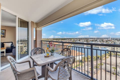 Savor your morning coffee on your private balcony with stunning panoramic city views stretching to the horizon.