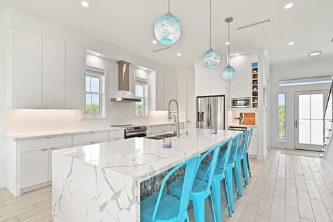 Spacious Kitchen with Ample Counter Space | Bar Seating