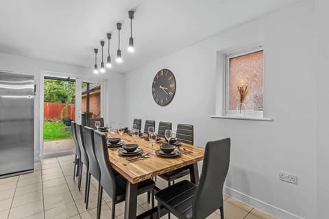 The dining area provides a warm and inviting space to enjoy meals together. Its thoughtful design creates the perfect setting for both casual gatherings and intimate dinners.