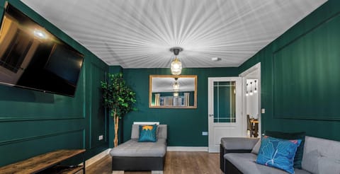 A thoughtfully designed space that blends style and comfort effortlessly—ideal for lounging, socializing, or settling in with a good movie.