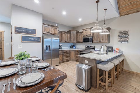 Full Kitchen with Dining area and Extra Bar Seating