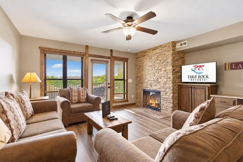 Living Area with Seasonal Fireplace, Cable TV, Direct Balcony Access