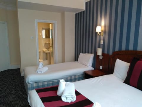 Desk, laptop workspace, free WiFi, bed sheets