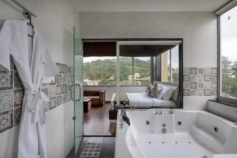 Suite | Bathroom | Separate tub and shower, slippers, towels, soap