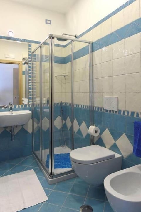 Basic Triple Room, Balcony, Mountain View | Bathroom | Shower, hair dryer, towels, soap