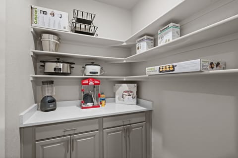 Pantry with various cooking supplies