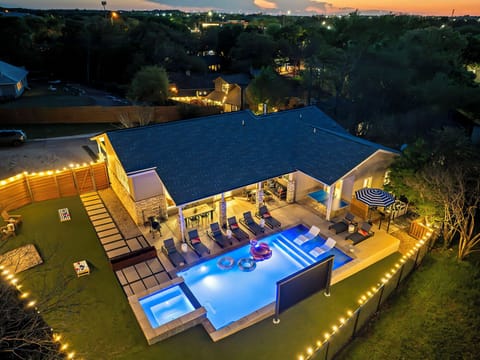 Check out this stunning aerial view of our dreamy pool surrounded by nature.