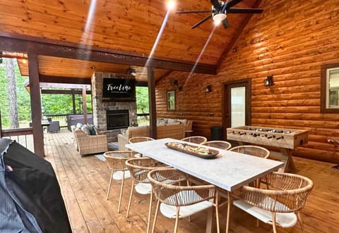 Outdoor dining at its finest, this spacious covered deck offers plenty of seating for group meals surrounded by nature.