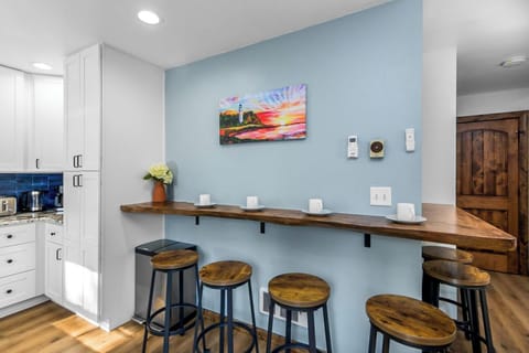 Its open layout keeps you connected with the kitchen and dining area.