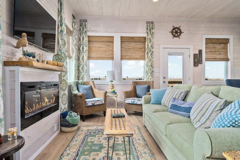 House, Multiple Beds, Patio, Pool View (St. Jo's Bungalow) | Living area | 42-inch flat-screen TV with digital channels, fireplace