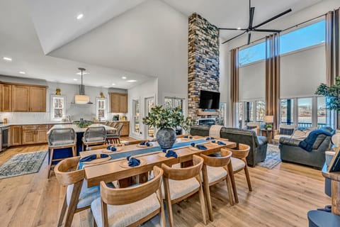 Large dining table that comfortably seats 10 with additional 6 barstools.