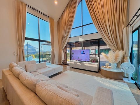 Deluxe Villa, 5 Bedrooms, Pool Access, Pool View | Living area | 32-inch flat-screen TV with cable channels