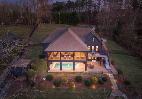 Welcome to The Retreat! Lake Normans newest house with an indoor/ outdoor salt water pool! 