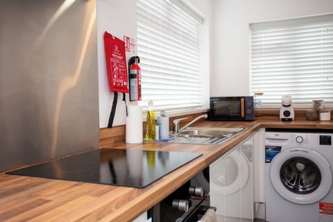 Say goodbye to the hassle of washing dishes by hand! Our modern dishwasher makes cleaning up after meals quick and easy, so you can spend more time relaxing and less time scrubbing.