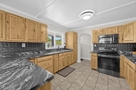 Kitchen: Ready for your morning coffee and more! Our spacious kitchen has everything you need.