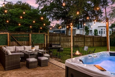 Killer Back Patio with Hot Tub, Grill, Firepit and Seating!
