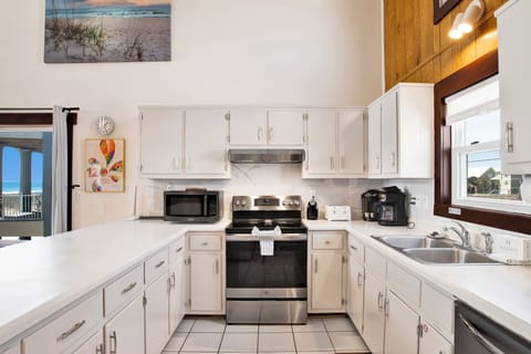 Updated stone counters with stainless steel appliances