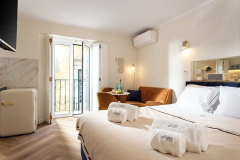 Deluxe Apartment, Kitchenette, City View | 1 bedroom, laptop workspace, blackout drapes, iron/ironing board