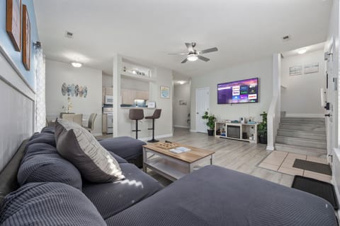 Living Room with kitchen counter, 65 inch smart TV and board games!