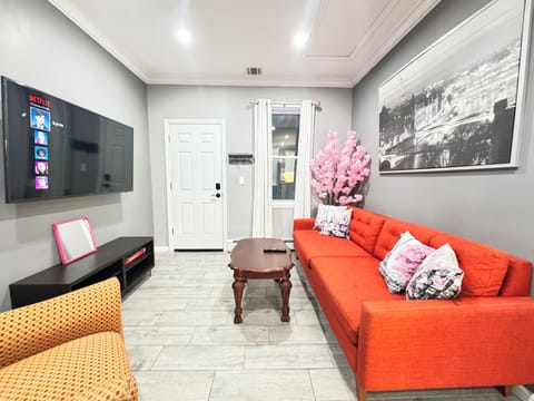 55 “ Smart TV with comfortable wide sofa.
