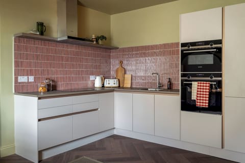 The modern kitchen is well-equipped