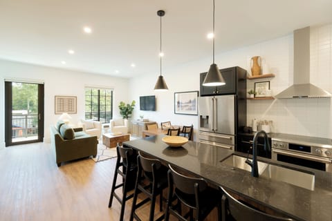 B206 Kotzum | Living area | 50-inch flat-screen TV with cable channels