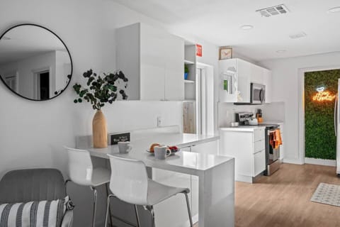 Whip up your favorite meals in this charming  kitchen, designed with modern touches.