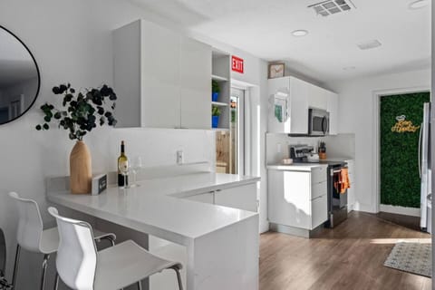 Whip up your favorite meals in this charming  kitchen, designed with modern touches.