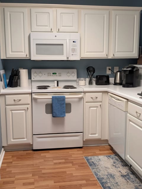 Microwave, two coffee makers and coffee! Dishwasher and plenty of dishes.