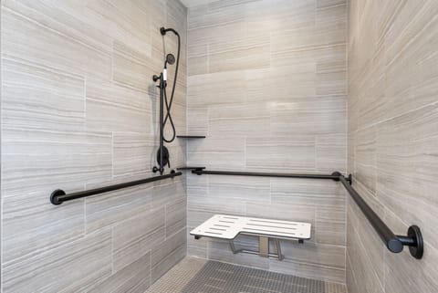 The ADA bathroom and shower are equipped with safety bars to ensure a comfortable experience for guests of all ages and varying mobility levels