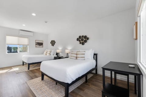 This upscale boutique features contemporary furnishings and two comfortable full beds for a peaceful night's rest