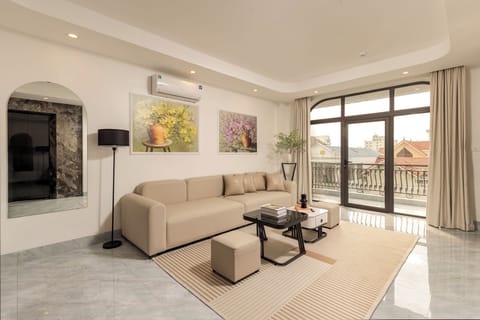 Family Apartment, 2 Bedrooms, Balcony | Living area | 22-inch TV with cable channels