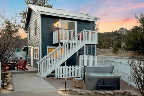 Welcome to our cozy home with a private hot tub, fire pit, and seating areas.