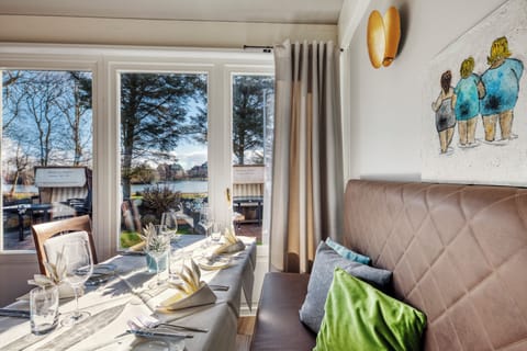 Breakfast, lunch, dinner served; garden views