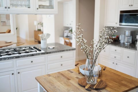 Making dinner with a view in this bright and open kitchen, is a dream come true