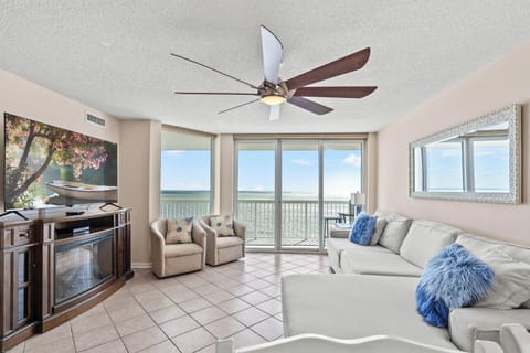 The ocean front living room is well-appointed with comfortable furnishings.
