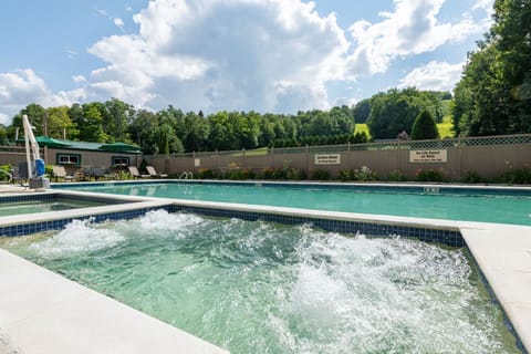 Unwind in the warm embrace of a bubbling spa, the perfect way to recharge after a day of adventure.