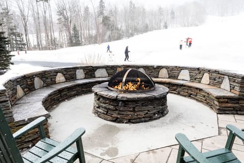 Gather around the fire pit, soak in the snowy scenery, and enjoy the perfect après-ski experience in the heart of the mountains.