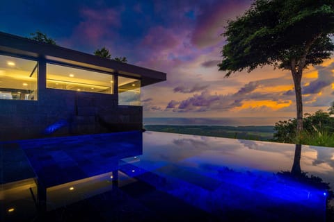 Beautiful sunsets and illuminated private swimming pool. 