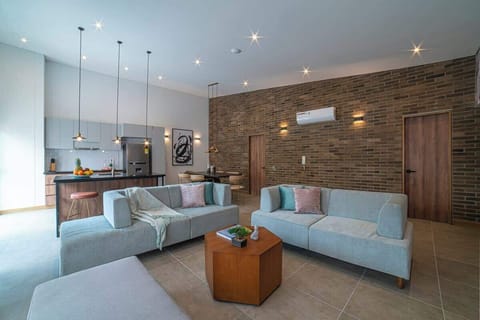 2 nice couches and a puff for you to watch Netflix and chill.