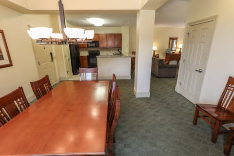 Dining area with a large table, perfect for family meals or gatherings with friends.