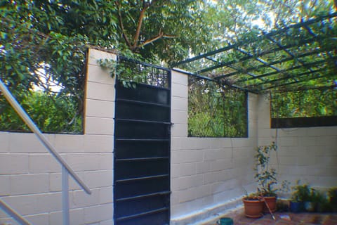 Deluxe Room, Balcony, Garden View | Terrace/patio