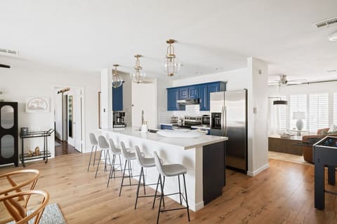 A fully stocked kitchen with all the comforts of home, including spices, cooking oils, balsamic vinegar, coffee, and more.