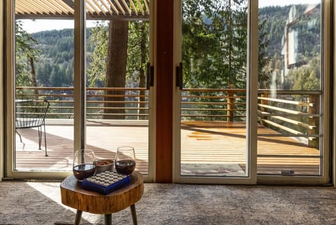 Sliding doors lead out to the large deck