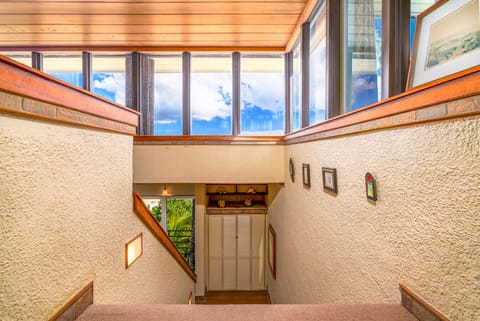 the staircase to/from the bedrooms and private deck.