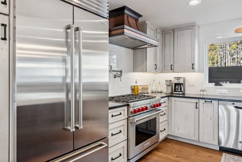 Kitchen: Sub-Zero refrigerator, Wolf oven, Keurig and Cuisinart coffee makers, and fully-equipped kitchen