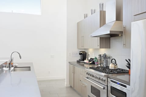 Modern appliances, a coffee nook, and a gas range. (Polo Villa 8)