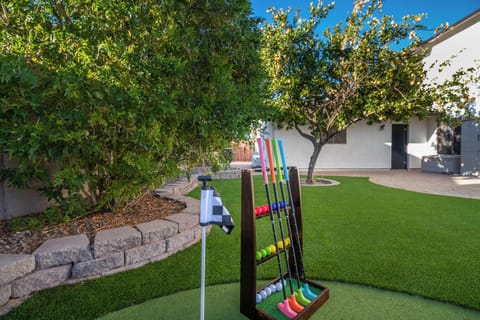 4 hole putting green with brand new turf lawn