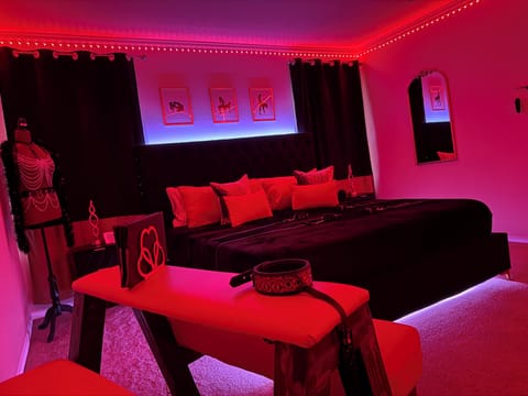 Step into your private Red Chamber — designed for couples seeking a bold, unforgettable escape.